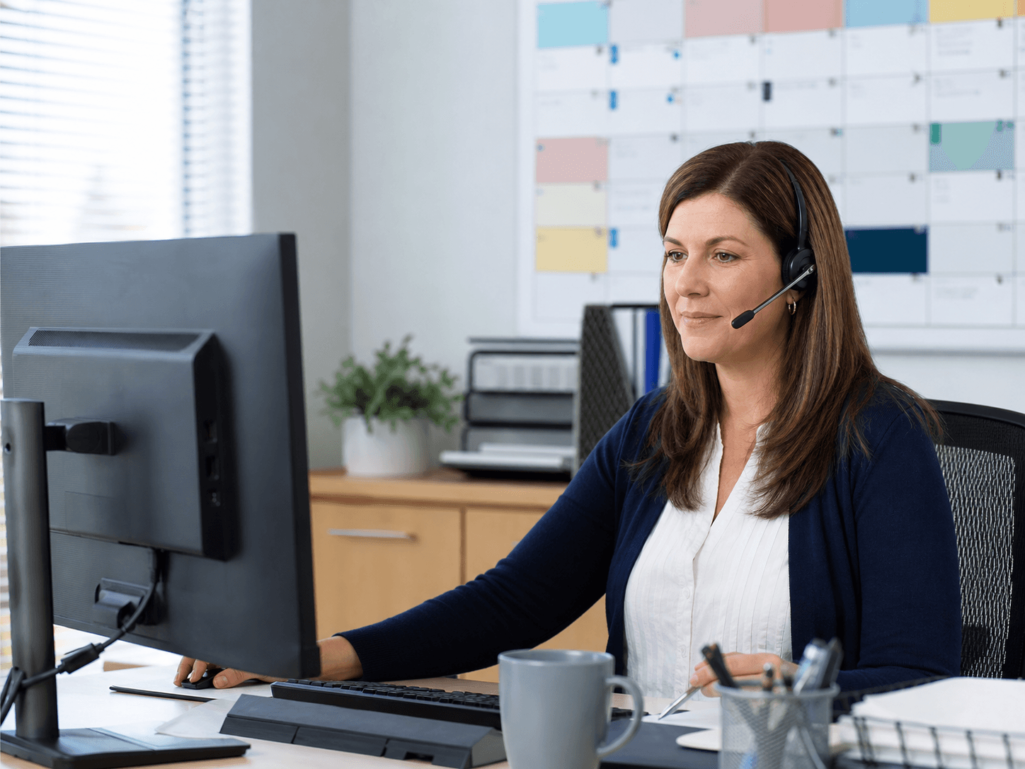 Office manager organizing local business customer requests